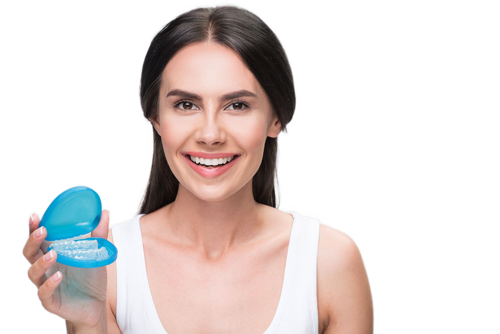 smiling woman holds case with clear aligners